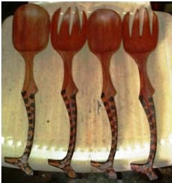 TWO LARGE SPOONS AND FORKS